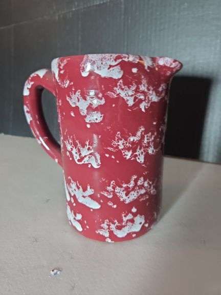 Red and White Pitcher with Unique Splatter Design image