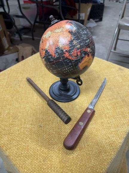 SMALL WORLD GLOBE, KNIFE, AND WOOD STICK image