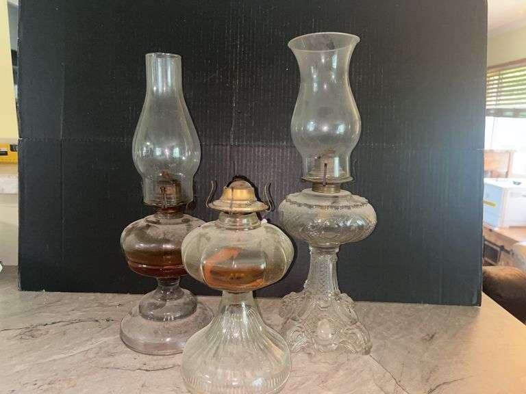 Group of Three Glass Kerosene Lamps image