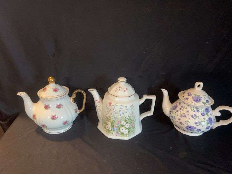 Set of Three Floral Porcelain Teapots image