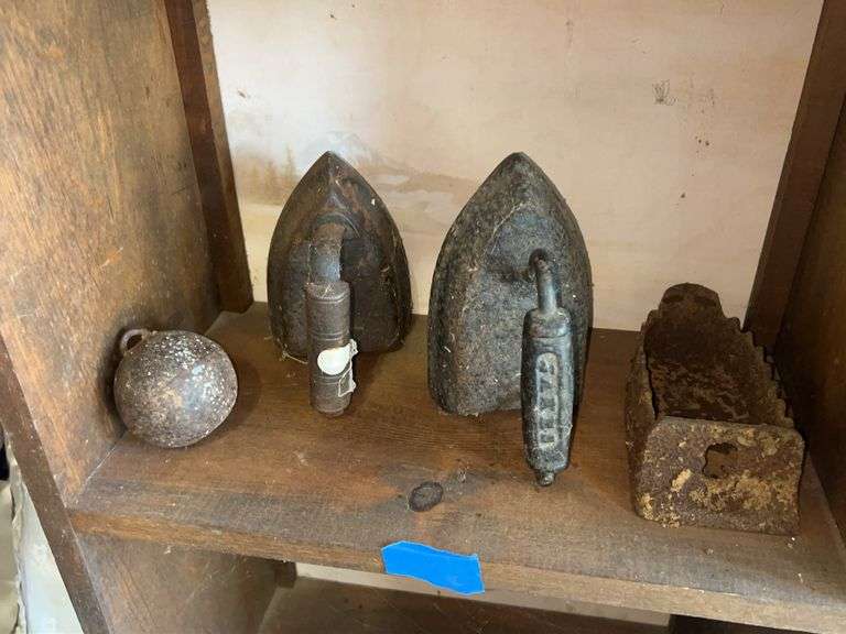 Assorted Metal Items - Flat Irons, Weight, and Holder image