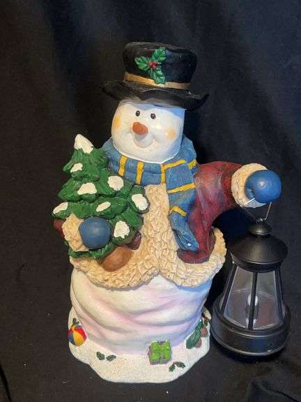 Festive Snowman Figure with Lantern image