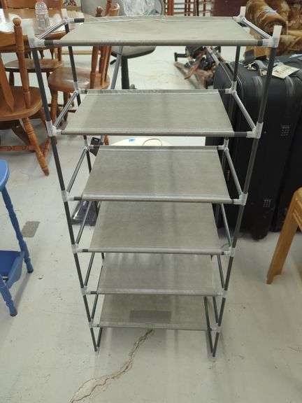 Multi-Tiered Gray Shelving Unit image