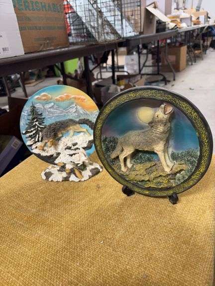 TWO WOLF PLATE STATUES image
