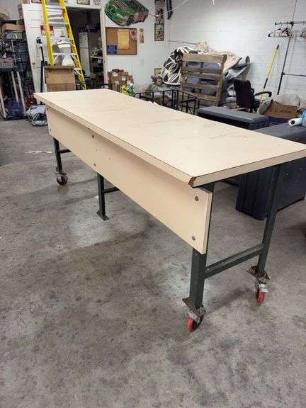 ROLLING WORK BENCH.  96 INCHES LONG. 30 INCHES WIDE. 38 INCHES TALL. VERY EASY ROLLING. image