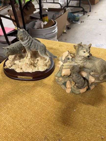 TWO WOLF STATUES image