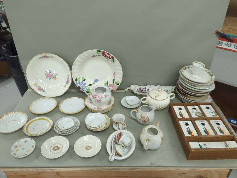 Assorted China Dishes and Spice Rack image