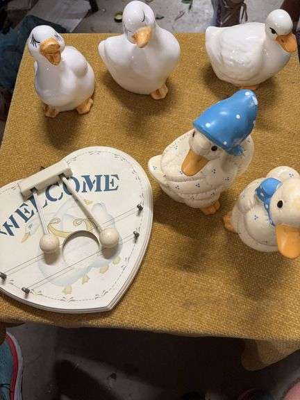 CONTAINER OF DECORATIVE VINTAGE DUCKS image