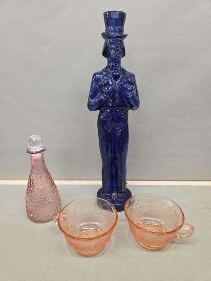 Collection of Decorative Glass Pieces: Decanter, Figurative Bottle, and Cups image