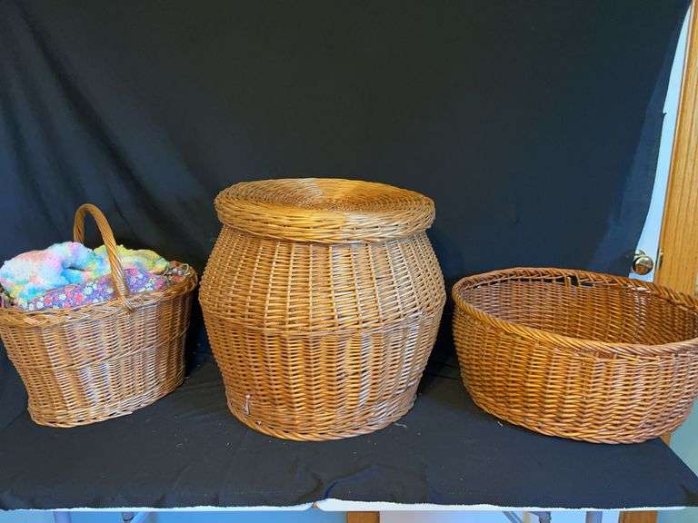 Three Wicker Baskets: One with Yarn and Fabric image