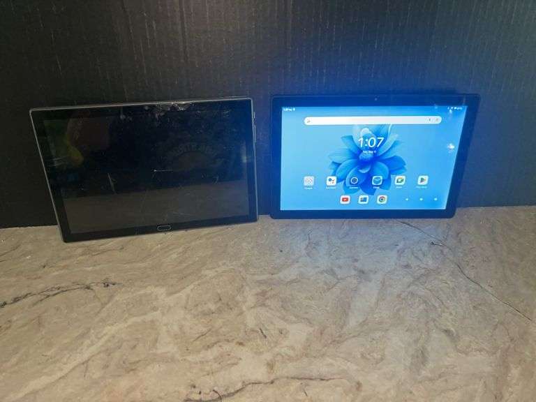 Two Meize Tablets: One Cracked Screen, One Working image