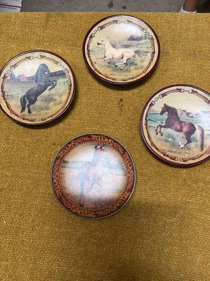 FOUR DECORATIVE HORSE PLATES image