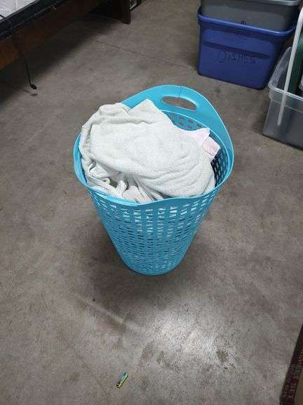LAUNDRY BASKET OF TOWELS image
