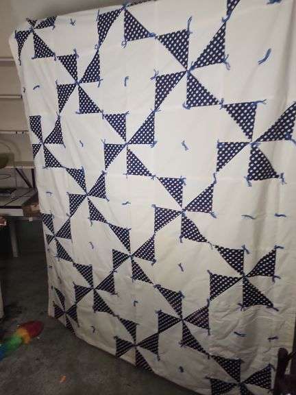 Handmade Quilt with Polka Dot Pinwheel Pattern image