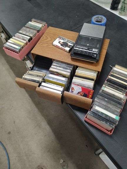 CASSETTE PLAYER WITH SEVERAL CASSETTE TAPES image