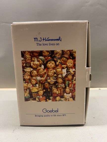 Goebel Hummel Figurine - Boy on Sled with Christmas Tree and Lantern image