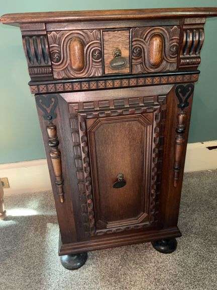 Ornate Carved Wood Cabinet image