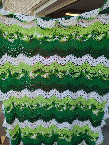 Green and White Crocheted Blanket image
