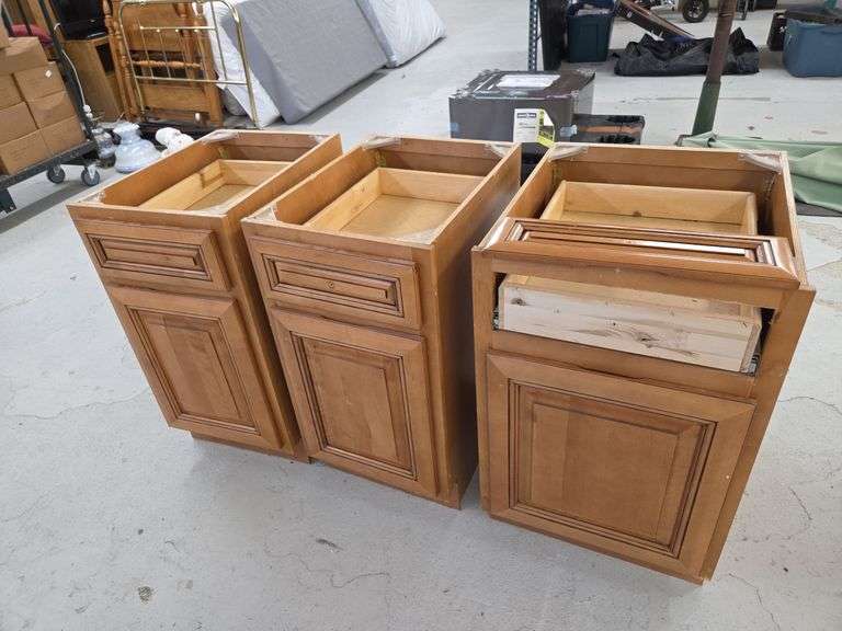 Three Wooden Base Kitchen Cabinets image
