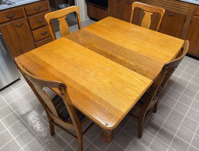 Wooden Dining Table with Four Chairs image