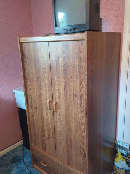 Wood Wardrobe with Sharp TV image