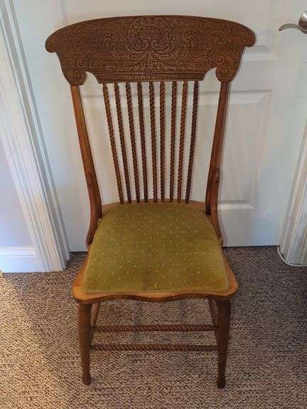 Wood Chair with Carved Back and Green Upholstered Seat image
