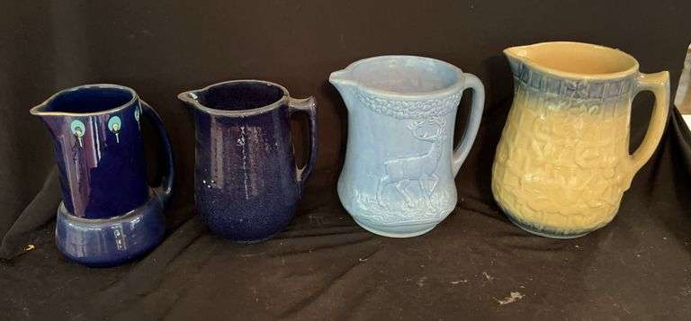 Collection of 4 Decorative Pitchers image