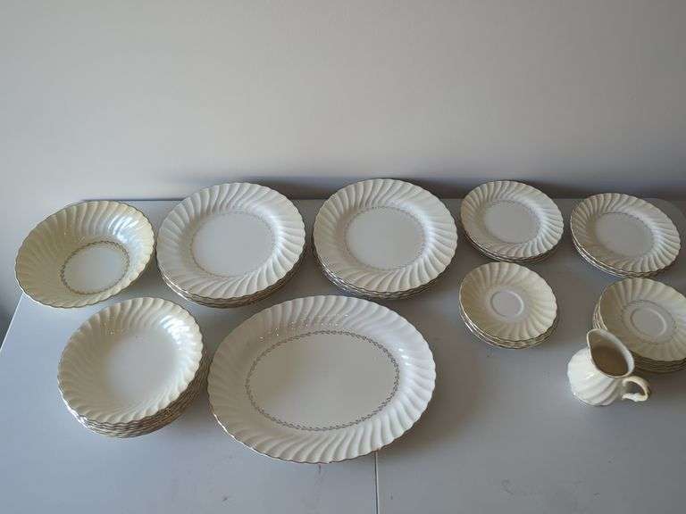 Dinnerware Set - Bowls, Plates, Saucers and Creamer image