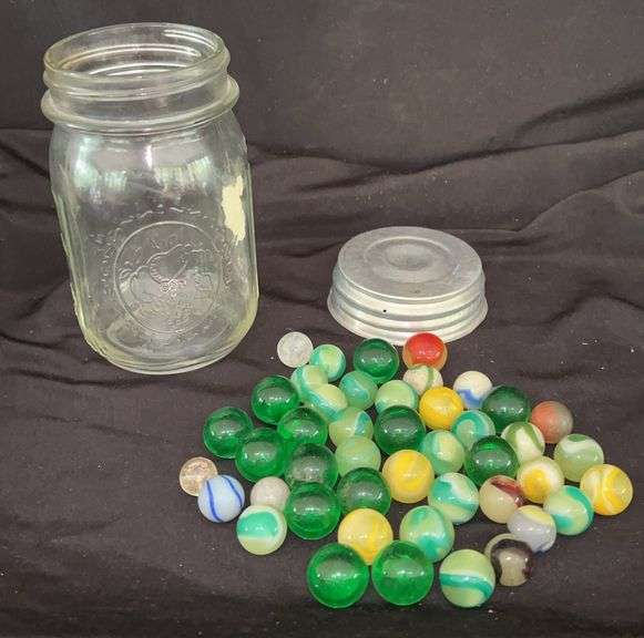 Uranium Glass Marbles Collection image