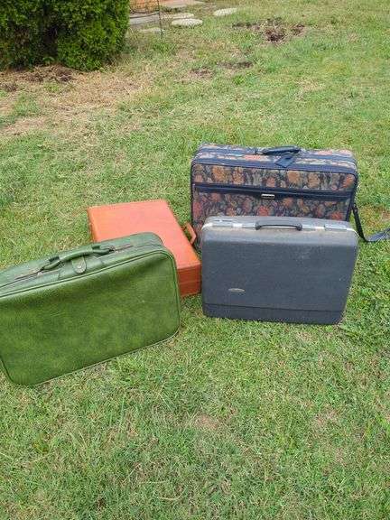 Group of Suitcases: Assorted Colors and Styles image