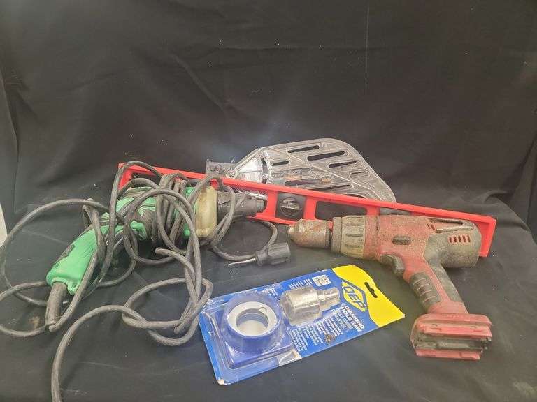 Power Tool Lot Including Drill, Saw, Level, and Hole Saw image