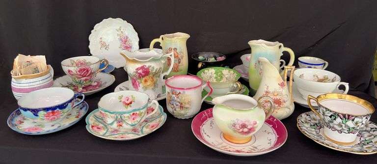 Assorted Decorative Tea Cups, Saucers, and Creamers image