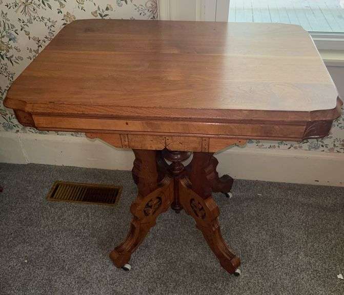 Inlaid Wood Table with Carved Legs image