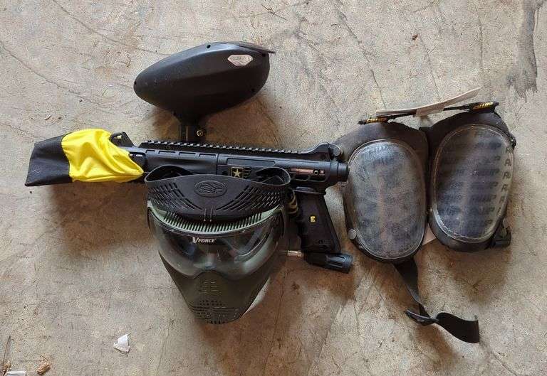 Paintball Gun With CO2 Canister Hose Connection, AWP Hard Shell Knee Pads, And VForce Adjustable