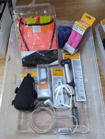 Bicycle Accessories Including Serfas Mini Pump, Headlight, Cable Lock, Cork Tape, Bottle Cage And More, Contents Of Tub image