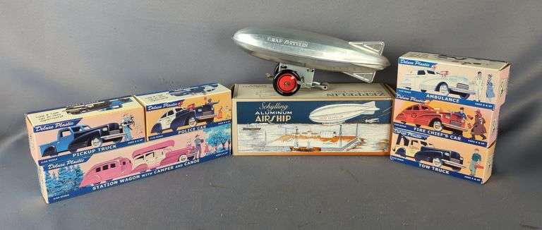 Schylling Aluminum Airship Wind-Up Toy, And Deluxe Plastic Cars And Trucks image