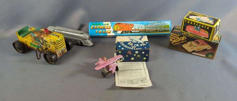 Tin Toys Including Wind-up Plane, Train, Tractor and Cars image