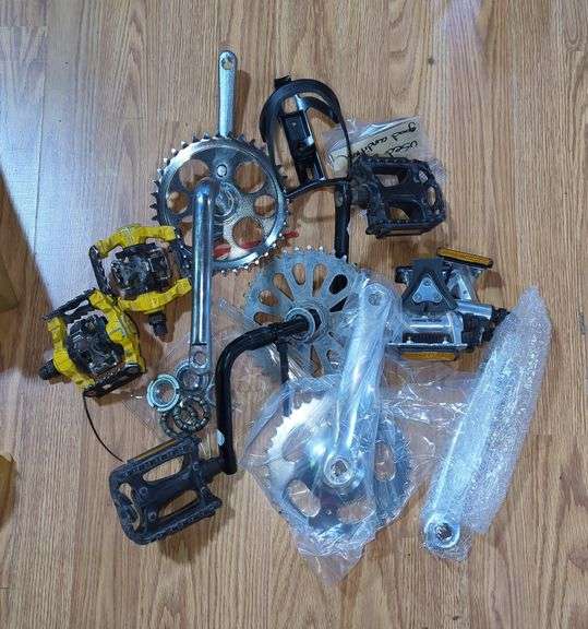 Bicycle Components Including Shimano 105 Pedals, Chainrings, Cranks And More, Contents Of Flat image