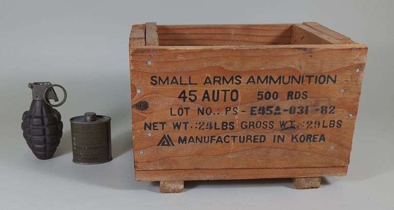 Inert Mk 2 Grenade, Empty WWII Rifle Bore Cleaner Tin, And 45 Auto Ammo Crate image