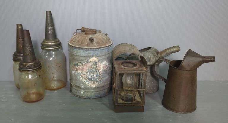 Oil Cans And Bottles, And Lantern image