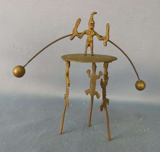 Handcrafted Brass Folk Art Balancing Sculpture image