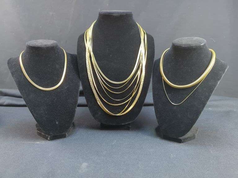 Collection of Nine Gold-Tone Fashion Necklaces - Avon and Monet