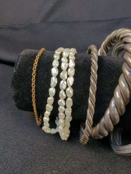 Collection of 9 Bracelets including Pearl, Flower Motif