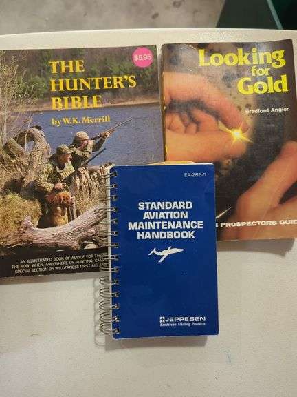 Books Including Guitar Directory, Signs and Symbols, Hunter's Bible, Prospector's Guide, Aviation Handbook