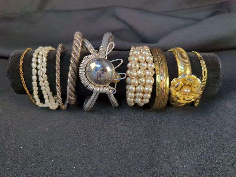Collection of 9 Bracelets including Pearl, Flower Motif