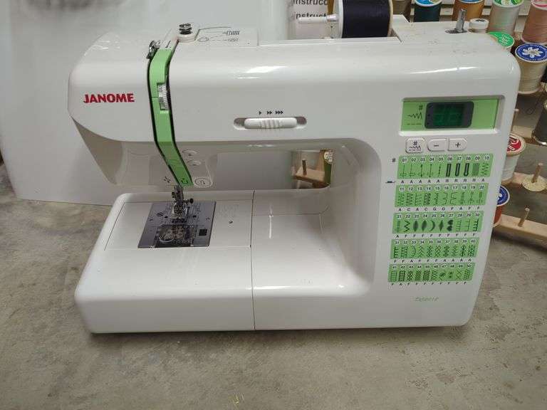 Janome Sewing Machine with Sewing Notions And Accessories