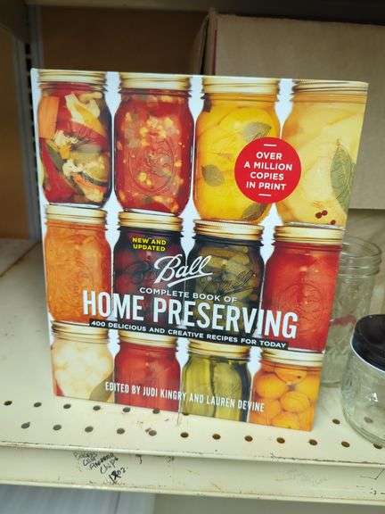 Home Canning Supplies Including Ball Jars, Jug, Book, and Accessories