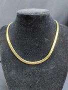 Collection of Nine Gold-Tone Fashion Necklaces - Avon and Monet