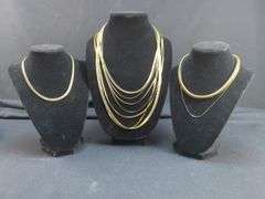 Collection of Nine Gold-Tone Fashion Necklaces - Avon and Monet