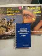 Books Including Guitar Directory, Signs and Symbols, Hunter's Bible, Prospector's Guide, Aviation Handbook